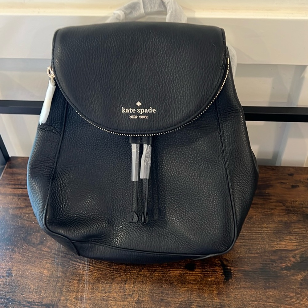 Small Kate spade black leather backpack/purse. Brand new. Never used.